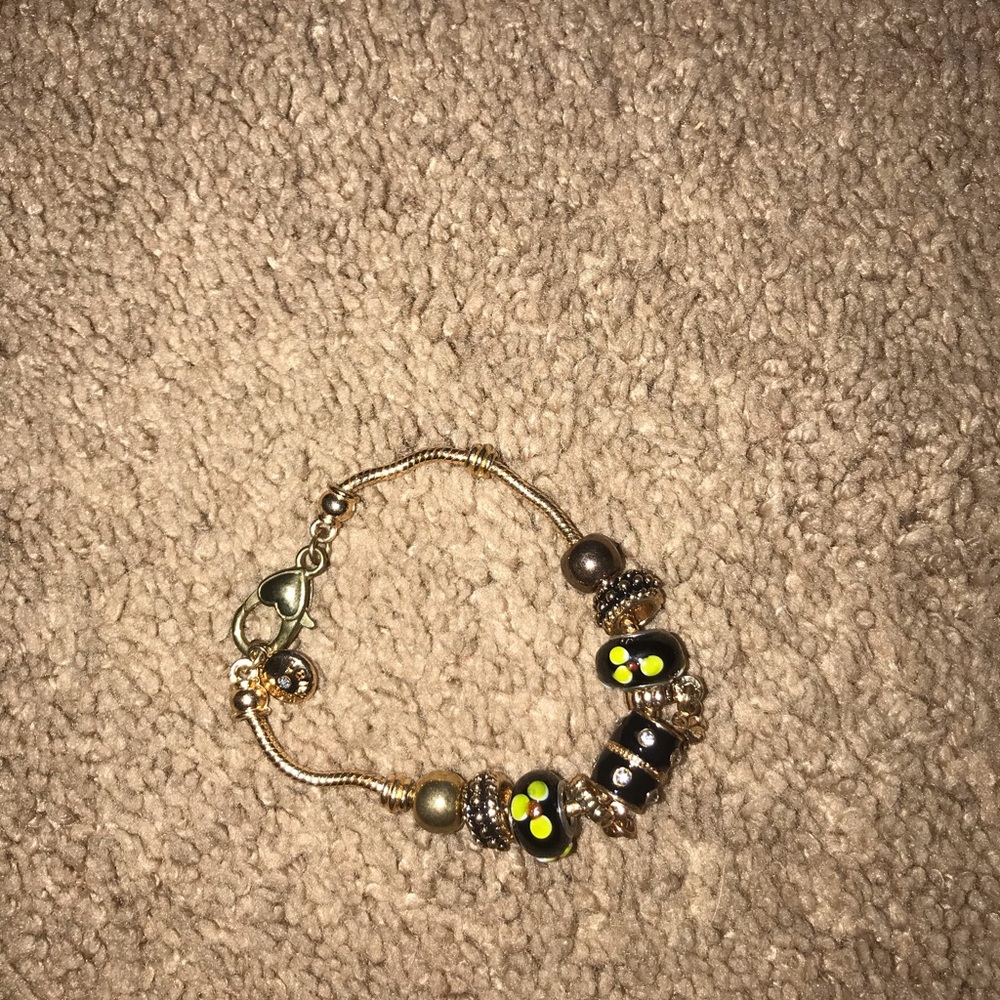Pandora bracelet plus two other bracelets